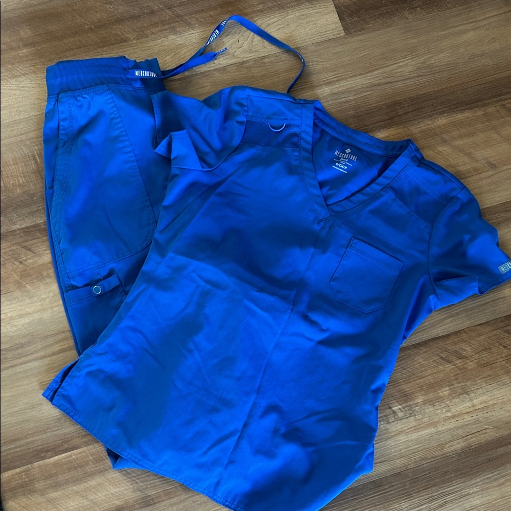 BOGO DEAL
Med Couture Blue Scrub Top & Joggers